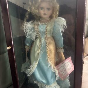 Blue Vintage-Style Porcelain Doll with Lace Dress